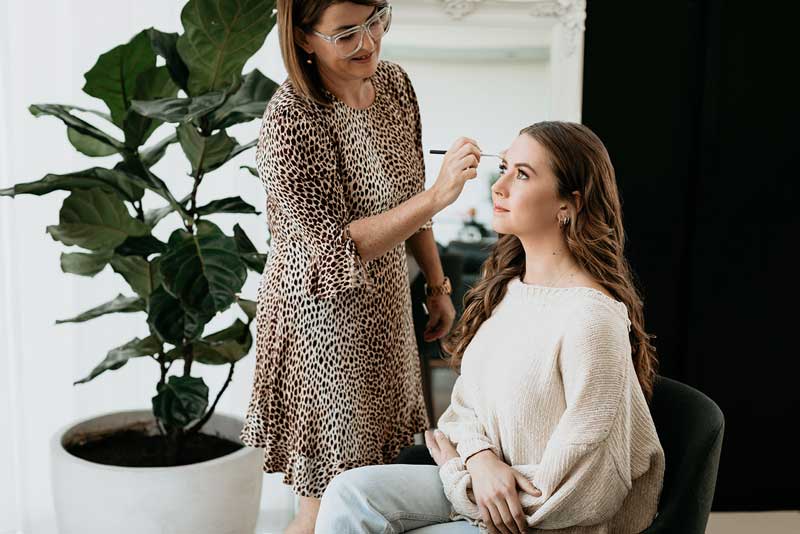 Tina providing makeup for wedding